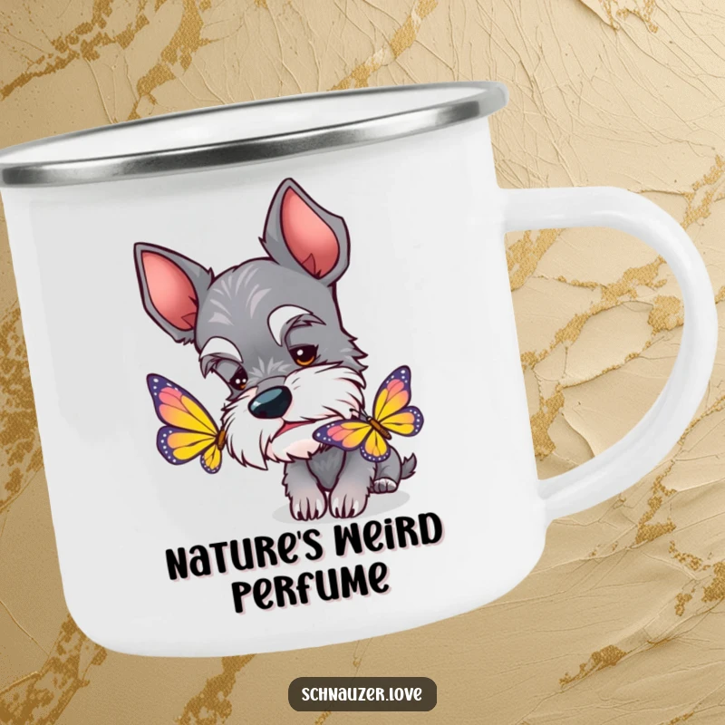 Funny Schnauzer Camping Mug: A curious schnauzer with perked ears sniffing a butterfly on a rugged outdoor adventure.