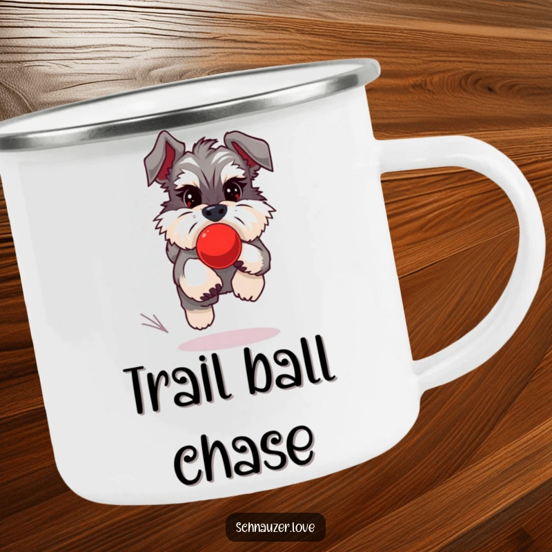 Funny Schnauzer Camping Mug depicting a schnauzer chasing a red ball, ready for outdoor fun and laughs.