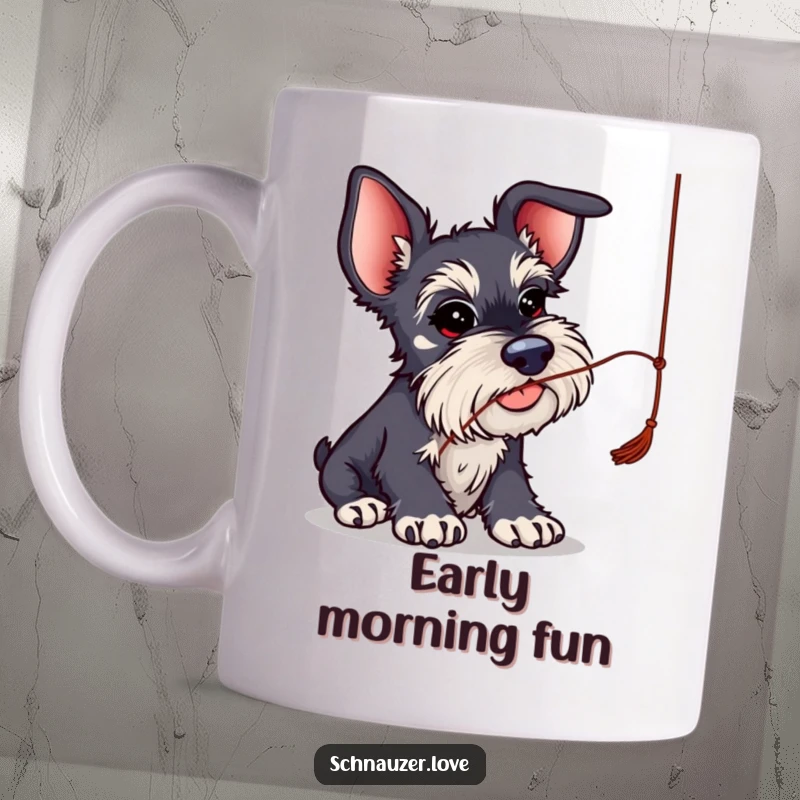 Funny Schnauzer Mug: Schnauzer with comically large ears playfully batting at a dangling string, full of mischief.