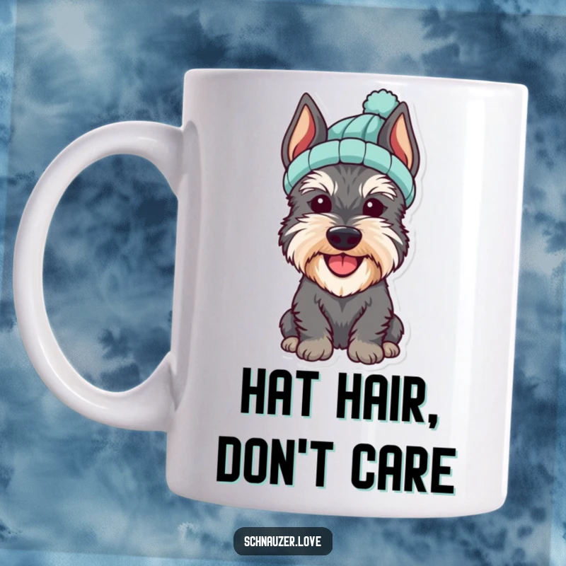 Funny Schnauzer Mug showing a cheerful dog wearing a cute, small knitted hat, exuding warmth and cuteness.