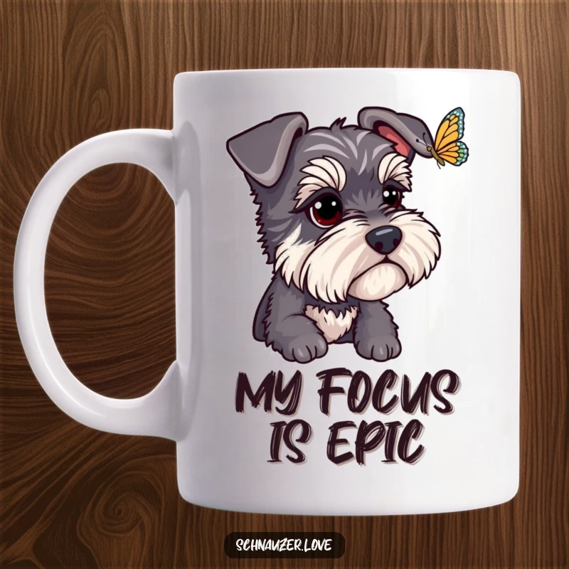 Funny Schnauzer Mug: A bright-eyed schnauzer intently watches a fluttering butterfly, showcasing a moment of pure, humorous focus. A wonderful funny gift.