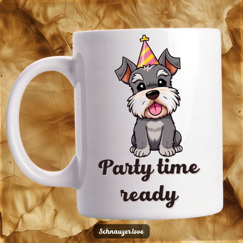 Funny mug depicting a schnauzer character wearing a festive party hat, tilting its head in a charming, curious pose.