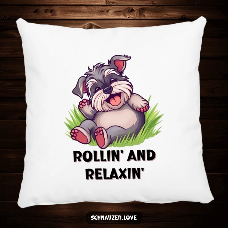 Funny Schnauzer Pillow featuring a delighted dog rolling happily on its back in soft green grass, a symbol of pure carefree joy.