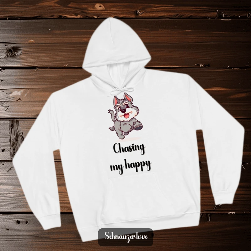 Funny Hoodie featuring a fluffy schnauzer joyfully chasing its tail, perfect for cozy, dog-loving wear.