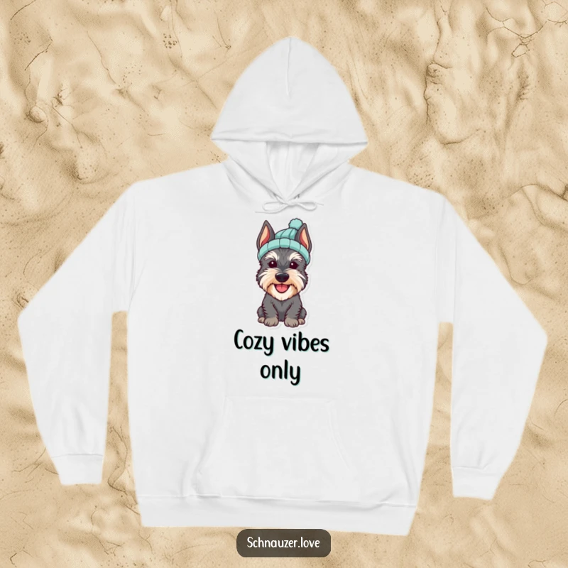Funny Schnauzer Hoodie showcasing a cheerful dog, adorned with a small, cozy knitted hat, radiating adorable charm.