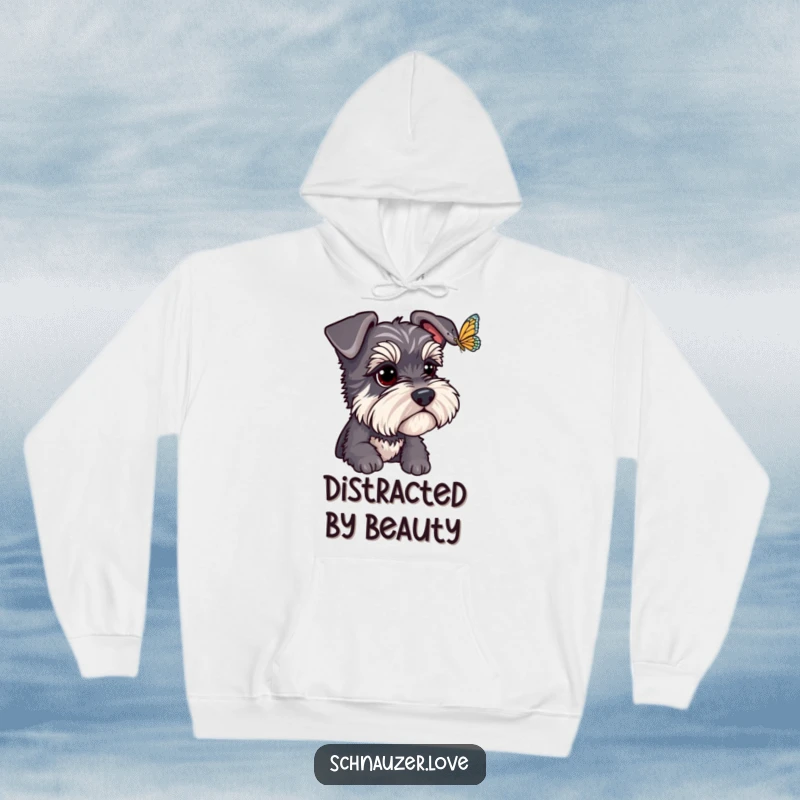 Funny Schnauzer Hoodie: A schnauzer intently watches a butterfly, its bright eyes full of humorous fascination. Cozy and whimsical funny gift.