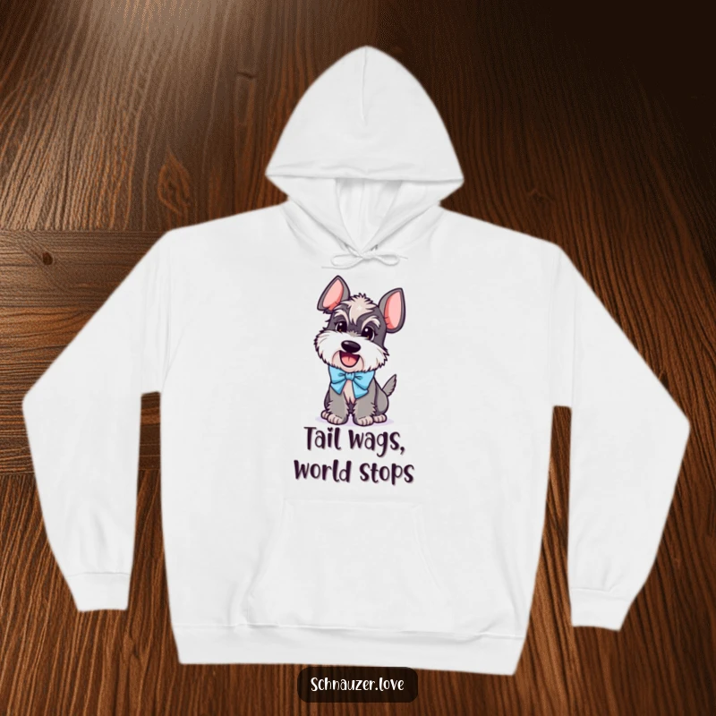 Funny Schnauzer Hoodie: A schnauzer character joyfully wagging its tail while sporting a fancy bow, perfect for cozy humor.