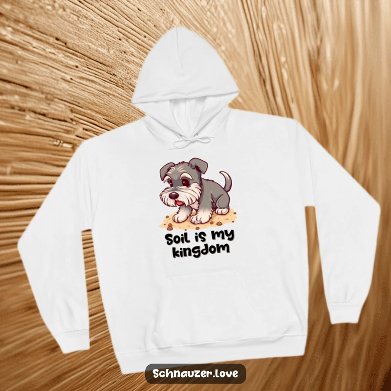 Funny Schnauzer Hoodie: A happy schnauzer with a wagging tail digging contentedly in soft, yielding soil.