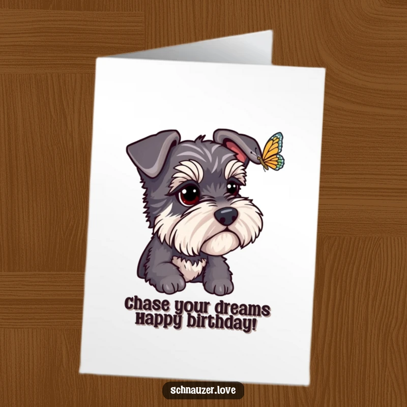 Funny Free Printable Birthday Card: Schnauzer with bright eyes gazes intently at a delicate fluttering butterfly, a whimsical scene.