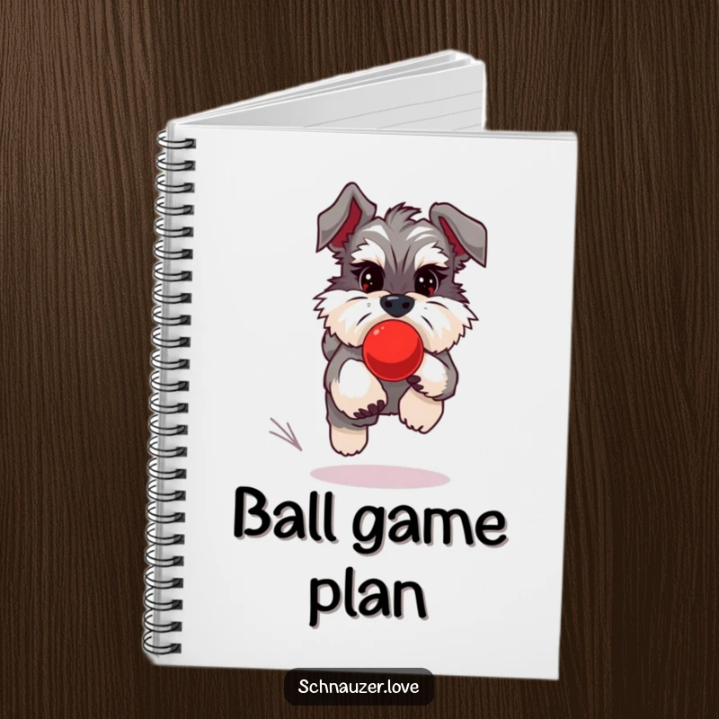 Funny Schnauzer Notebook showing a schnauzer chasing a red bouncing ball, ideal for jotting down ideas with enthusiasm.