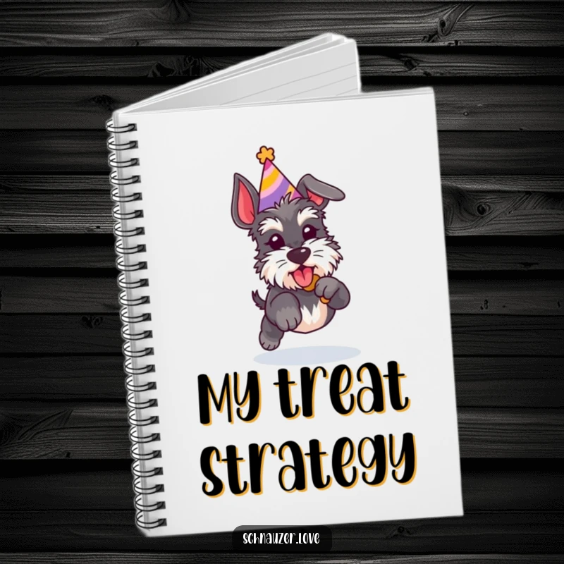 Funny Schnauzer notebook with a dog in a party hat jumping for a treat, perfect for notes and inspiration.