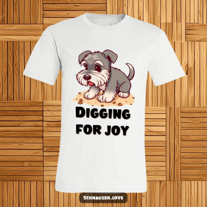 Funny Schnauzer T-Shirt: A happy schnauzer with a wagging tail digging enthusiastically in soft soil, full of joy.