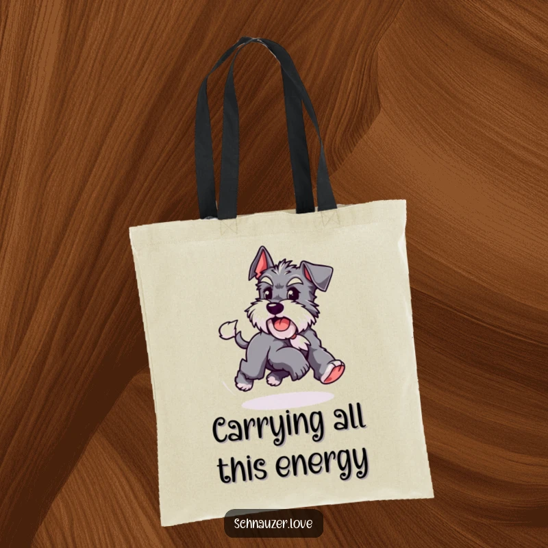 Funny Schnauzer tote bag featuring a playful dog chasing its tail in a circle, perfect for carrying essentials with humorous canine energy.