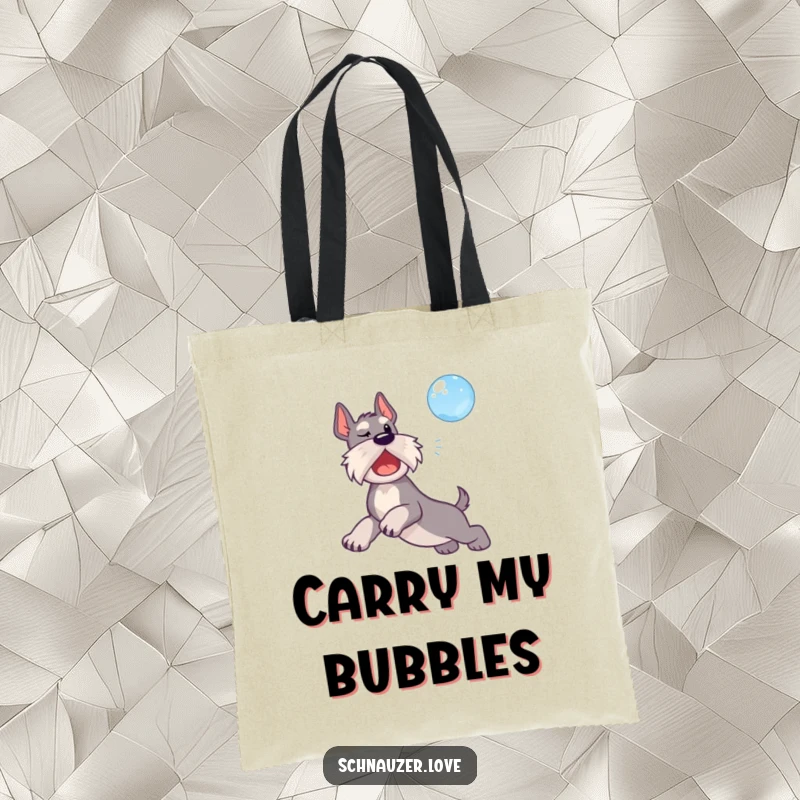 Funny tote bag featuring a schnauzer dog leaping enthusiastically to catch a floating bubble.