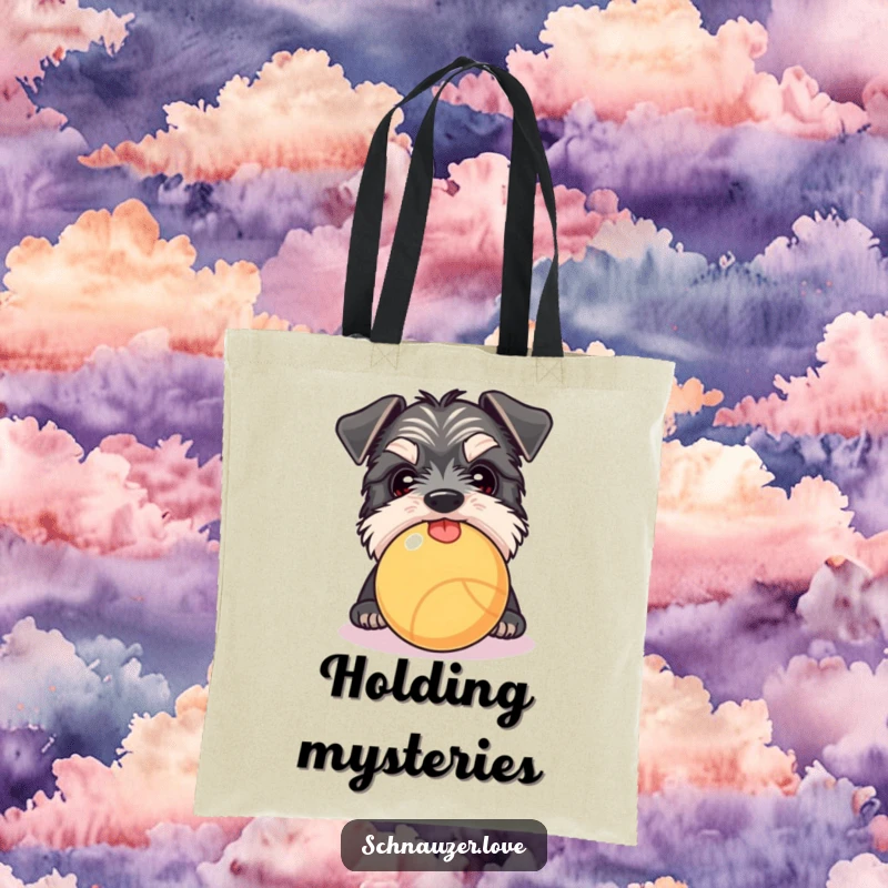 Funny Schnauzer tote bag with a dog peeking over a ball, tongue slightly out, perfect for carrying items.